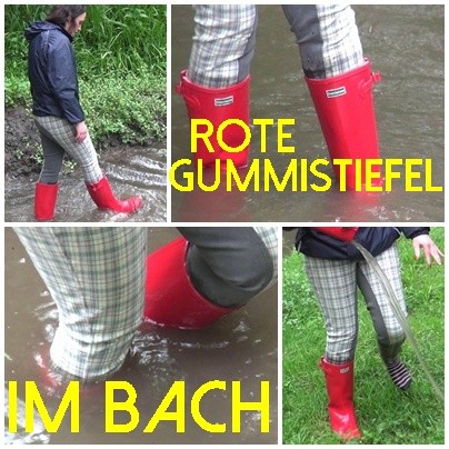 Rote Gummistiefel im Bach