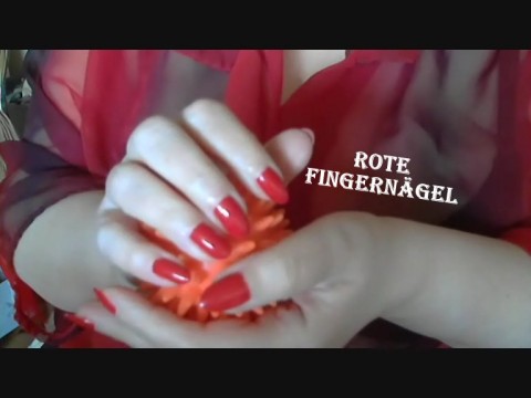 rote Fingernägel für stille Geniesser