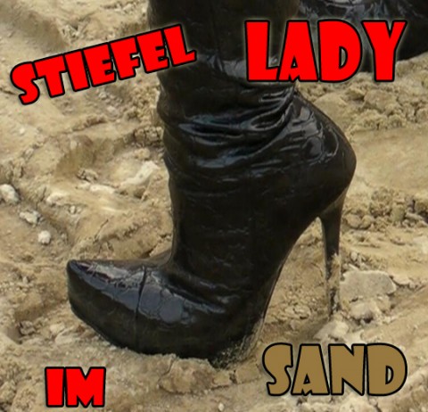 Lady boots in sand