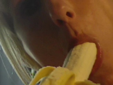 Mouth and tongue plays with banana